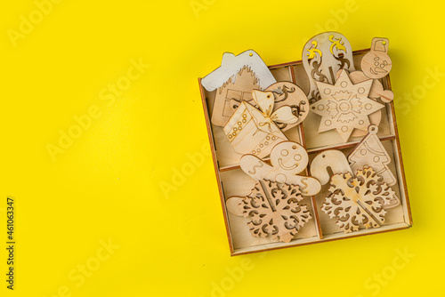 Christmas new year background with handmade wooden eco fir tree decorations, top view
