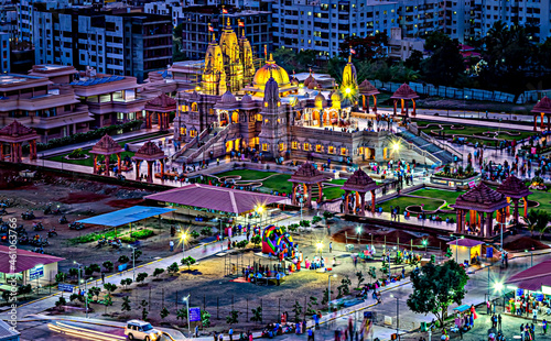 Shree Swaminarayan temple with beautiful night lighting in Pune, India . photo