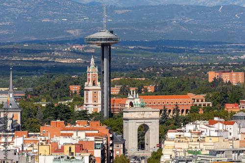 Madrid, Spain- October 5, 2021: Aerial view of the Moncloa Lighthouse and the Arc de Triomphe in Madrid. Madrid landscape. photo