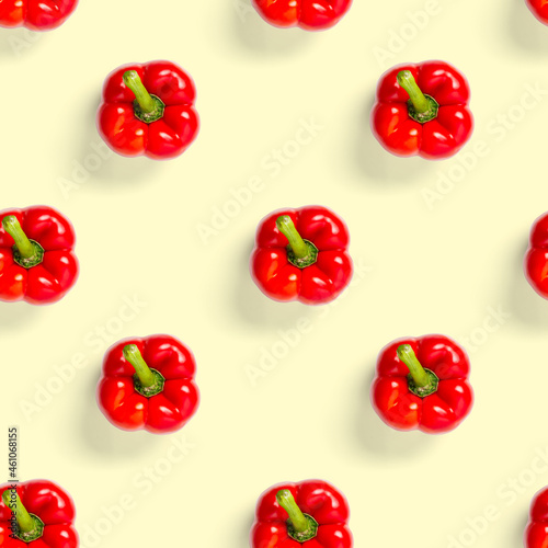 seamless pattern of bulgarian red pepper on yellow background. paprika wallpaper, sweet pepper print pattern, top view, flat layout, isolated.