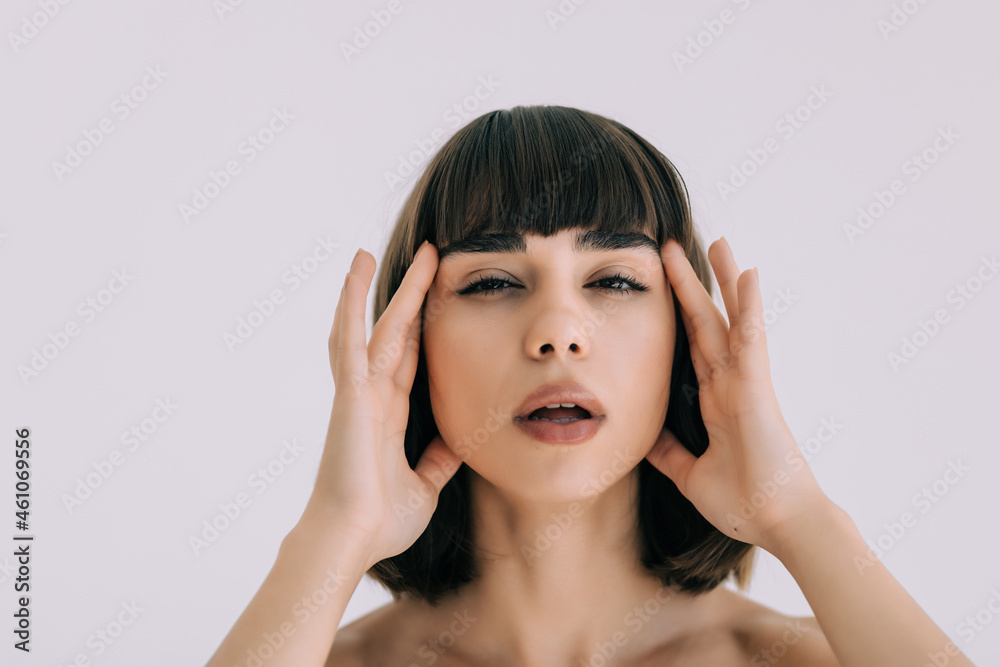 Beautiful sensual woman touching her face. Beauty and skincare concept. Spa. Beautiful sensual woman touching her face. Beauty and skincare concept. Spa.