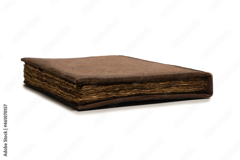An old brown book isolated on white background. An old brown book isolated on white background.