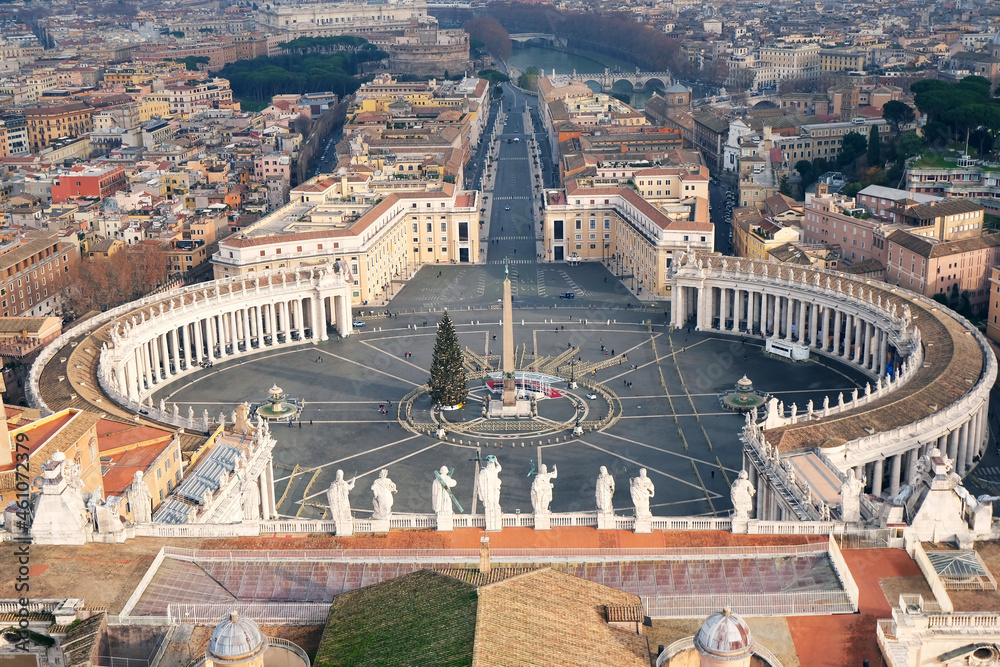  Aerial view on Vatican City with a Christmas tree in the middle of the Square, with no people
