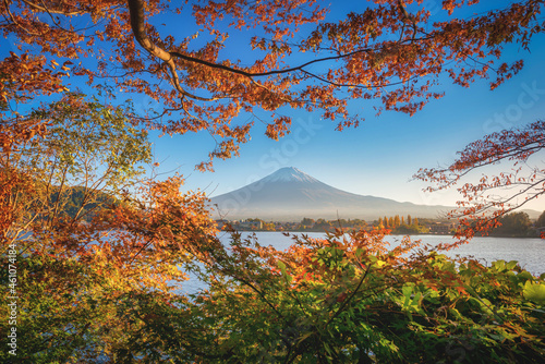 Mt. Fuji over Lake Kawaguchiko with autumn foliage at sunset in Fujikawaguchiko  Japan.