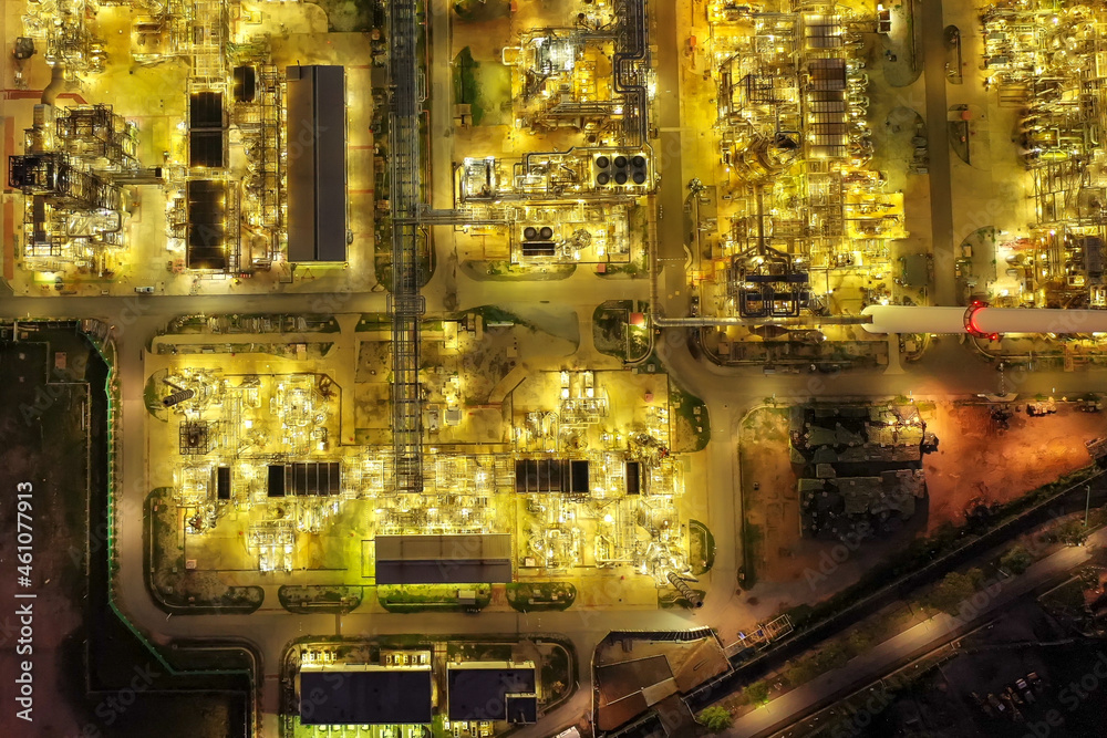 Aerial view of twilight petrochemical oil refinery plants,sea ...