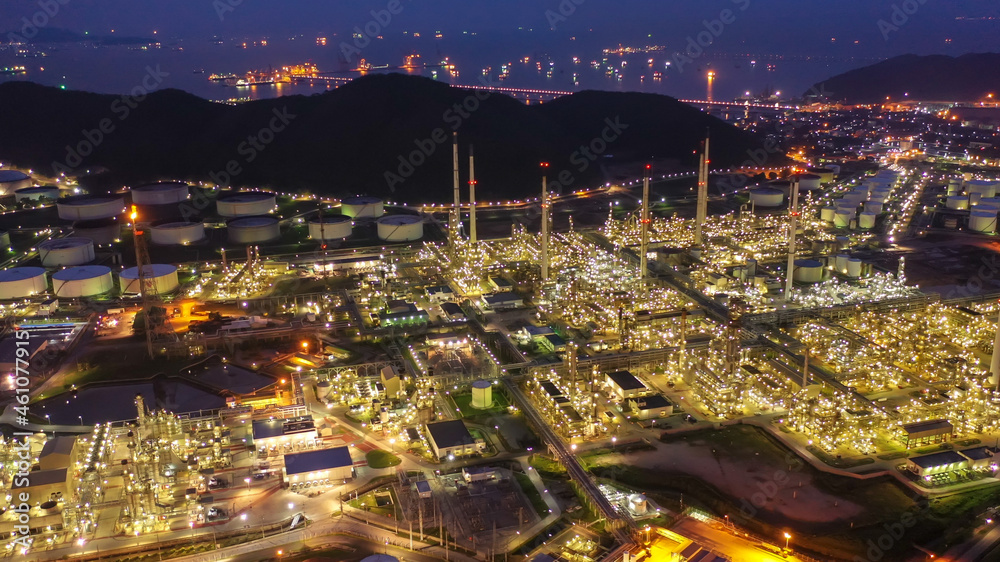 Aerial view of twilight petrochemical oil refinery plants,sea ...