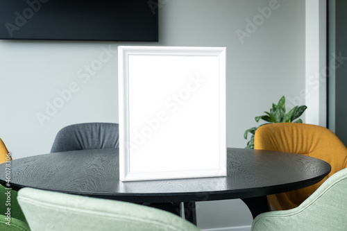Blank award template mockup in modern office room. Empty picture frame. Insert your text or design for certificate or diploma. © Cloudy Design