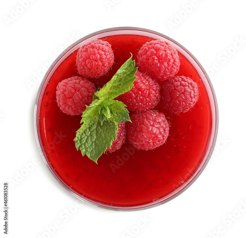 Delicious raspberry jelly with fresh berries and mint isolated on white, top view