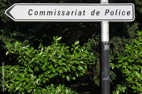 Police station road sign and direction in France called commissariat de police in french language