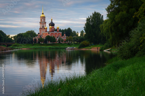 Resurrection Cathedral on the bank of the Polist River in the cloudy summer day, Staraya Russa, Novgorod Region, Russia