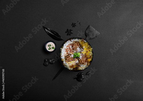 Indian foods blows, with the species and ingredients on a grey Background.