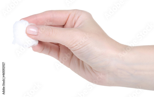 Medical cotton wool in hand on white background isolation