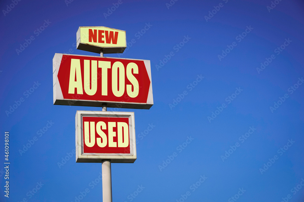 Aged and worn new and used autos sign Aged and worn new and used autos sign