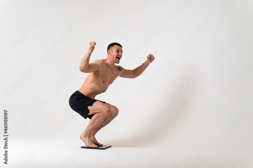 Fototapeta premium Man with weights health pondered, health and sports on a white background pain sore painful, backache person male young stress, chronic. lumbar ain suffer attractive