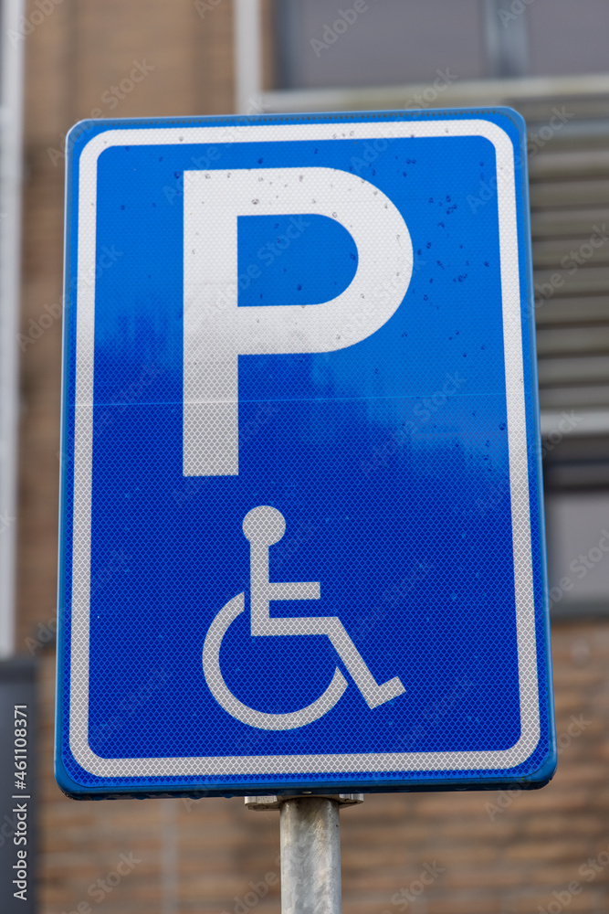 Road sign. Disabled parking space Road sign. Disabled parking space