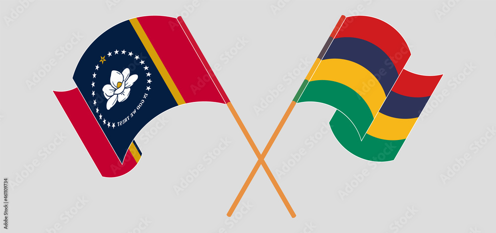 Crossed and waving flags of The State of Mississippi and Mauritius