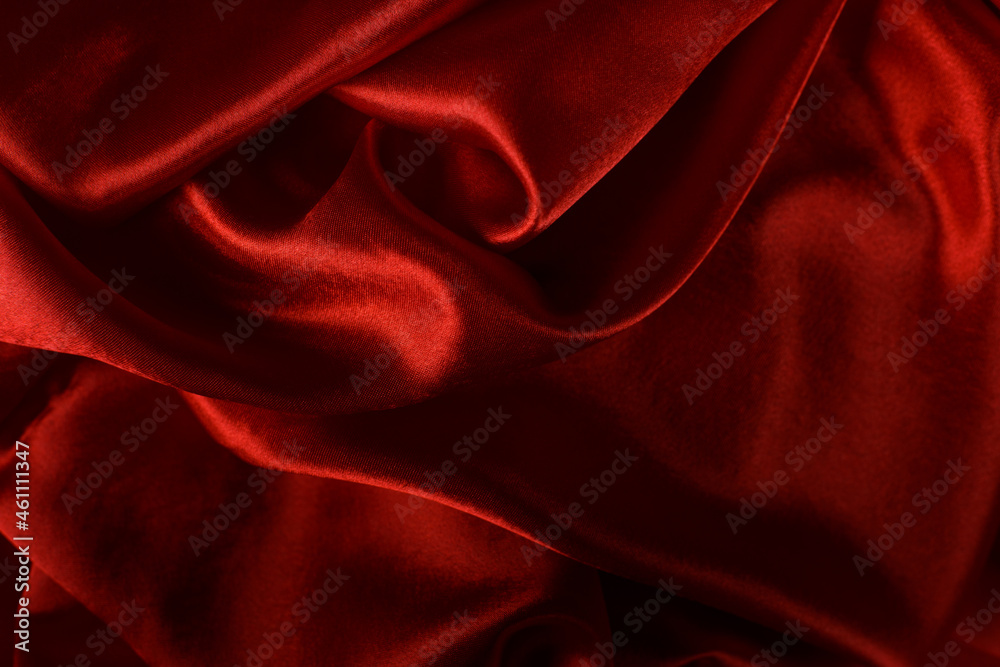 Elegant bright satin with waves. Fabric backdrop, view from above. Luxury cloth texture. Prefect as an abstract background with copy space, close-up. Elegant bright satin with waves. Fabric backdrop, view from above. Luxury cloth texture. Prefect as an abstract background with copy space, close-up.