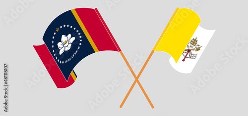 Crossed and waving flags of The State of Mississippi and Vatican