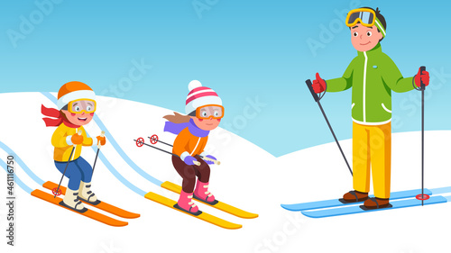 Father, daughter, son kids skiing on snowy slopes