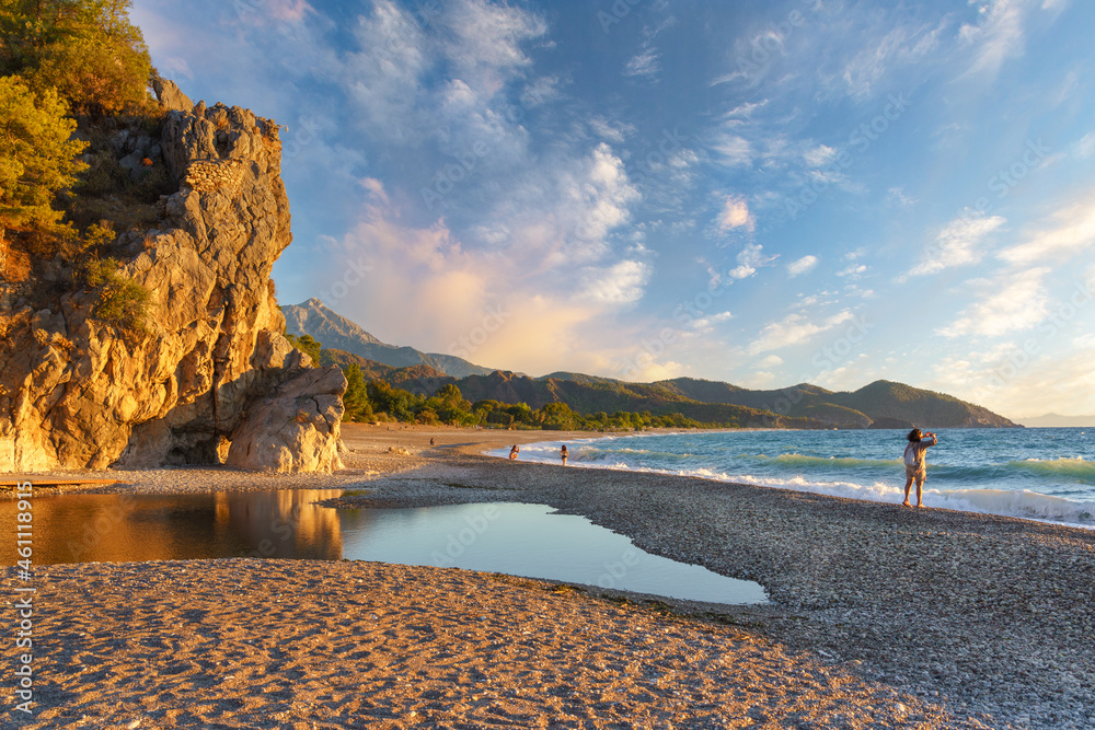 Fototapeta premium Cirali Olympos beach at sunrise. Sea and mountains. Kemer, Antalya, Turkey.