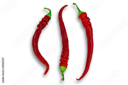 Three red hot peppers isolated on white background. Image for project and design.