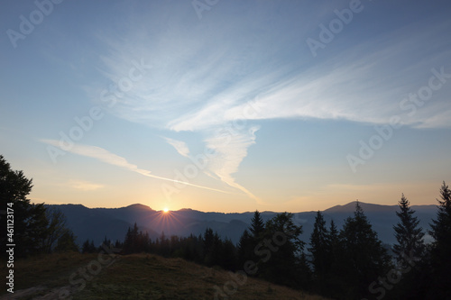 Picturesque view of mountain landscape and beautiful sunrise sky © New Africa