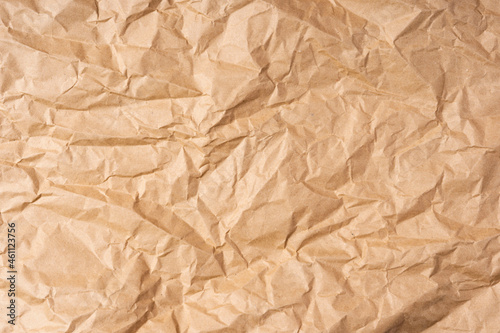 Crumpled wrapping paper background, beige rough sloppy creative background, wrapping paper texture