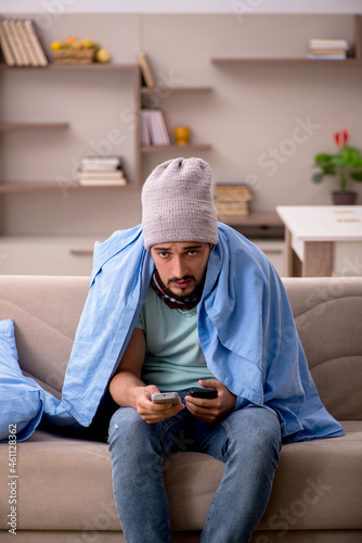 Young man suffering at home