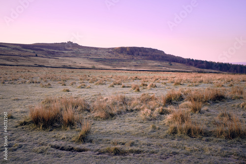 Dawn light over Over Owler Tor and Millstone Edge on a frosty morning, Peak District, UK