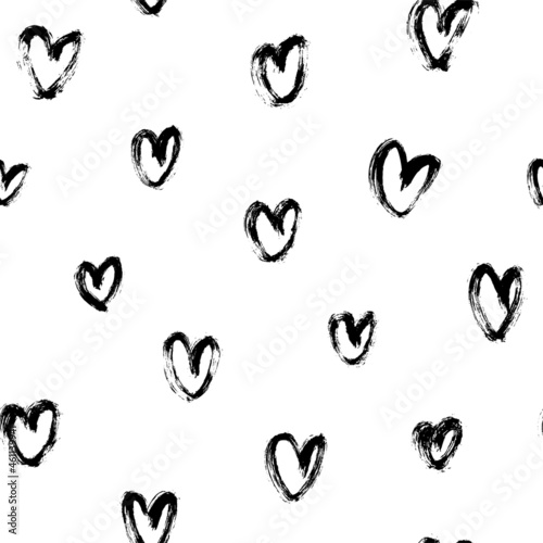 Vector pattern with hand-drawn black hearts. Polka dot ornament. Linear silhouettes of charcoal hearts. Black-white seamless pattern for Valentine s Day. Simple repeating chaotic texture.