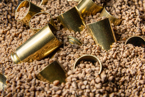 Reloading 9mm brass casing: cleaning and polishing  with tumbler using walnut shell media.