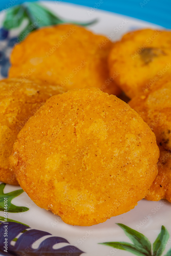 Preparation of the traditional dish from the Caribbean Coast in colombia called Arepa de Huevo or egg arepa Preparation of the traditional dish from the Caribbean Coast in colombia called Arepa de Huevo or egg arepa