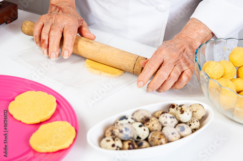 Preparation of the traditional dish from the Caribbean Coast in colombia called Arepa de Huevo or egg arepa
