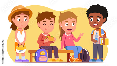 School students sitting on bench, eating, chatting