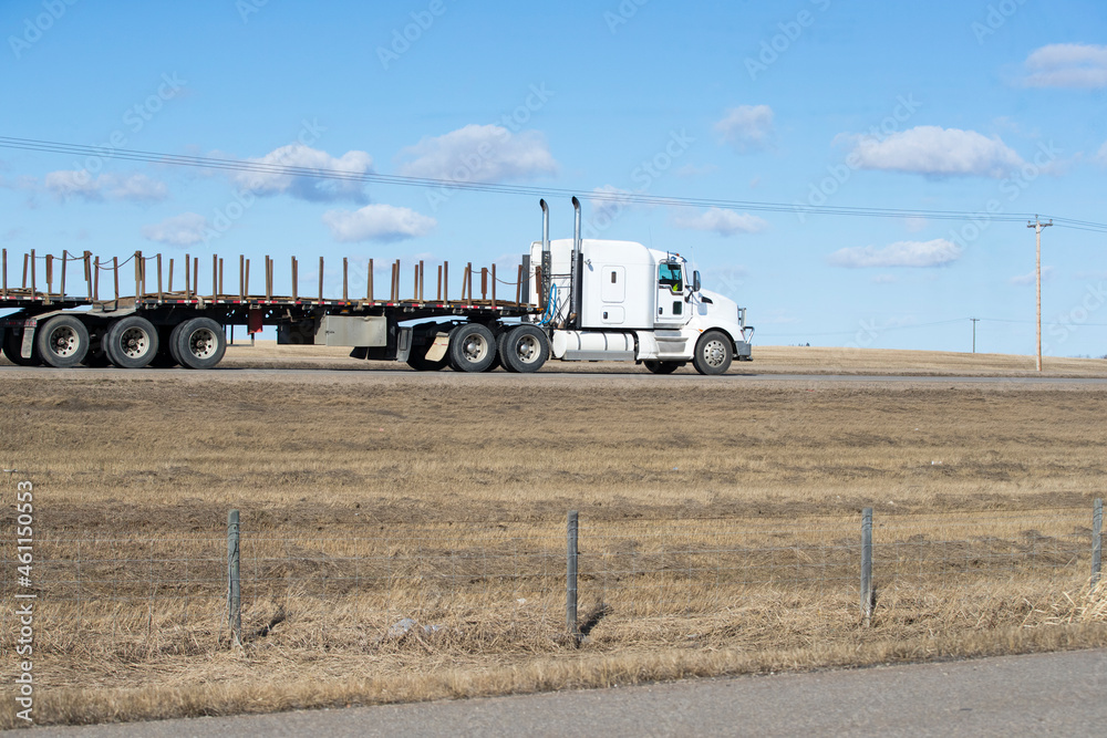 Heavy Cargo on the Road. A truck hauling freight along a highway