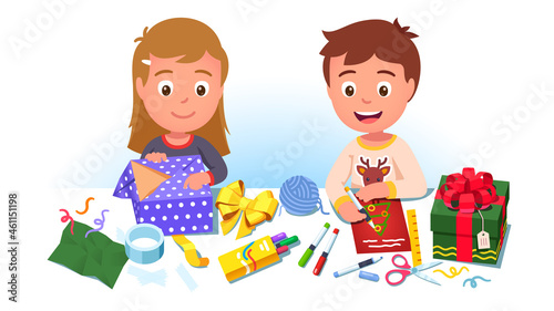 Two kids wrapping decorating holiday gift boxes