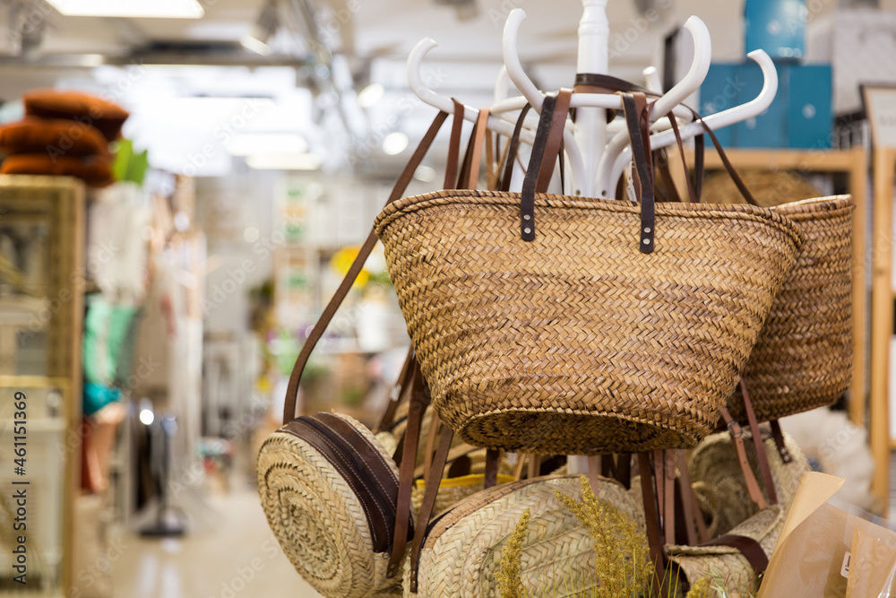 Handmade women straw bags in a european store. High quality photo