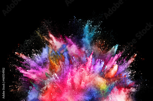 abstract colored dust explosion on a black background.abstract powder splatted background,Freeze motion of color powder explodingthrowing color powder, multicolored glitter texture.