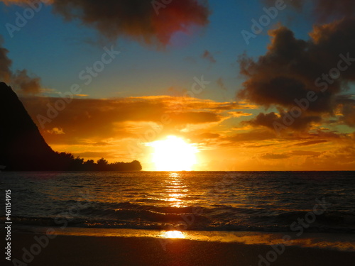 Beautiful sunset in Hawaii by ocean