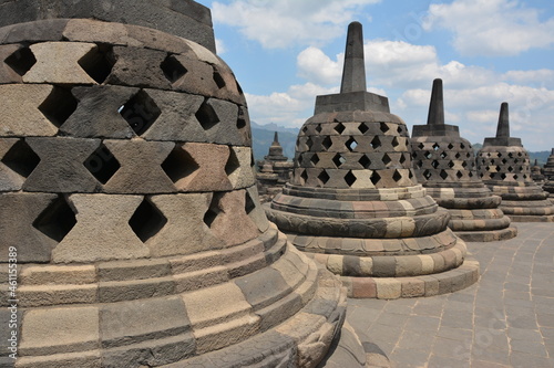 Stupas at the Borobudur temple in Central Java, Indonesia photo