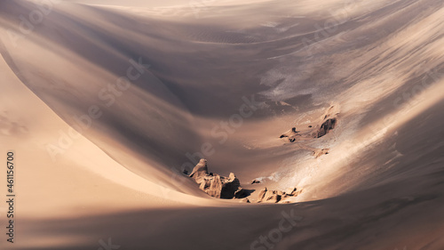 the formation of kaluts or sand stones or yardang in dasht e lut or sahara desert, iran. Nature and landscapes of desert. Middle East desert photo