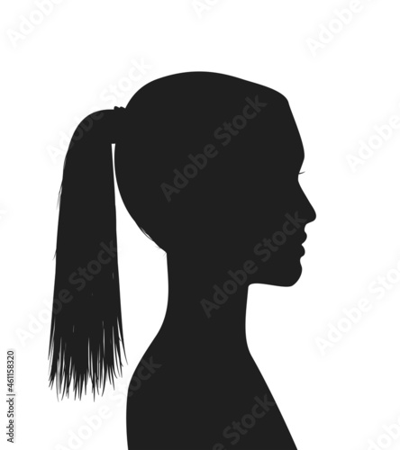 Silhouette of a young woman with ponytail hairstyle.