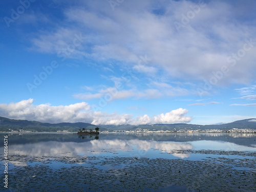 Panorama view of the lake Suwa in the Kiso Mountains, Nagano, Japan.
