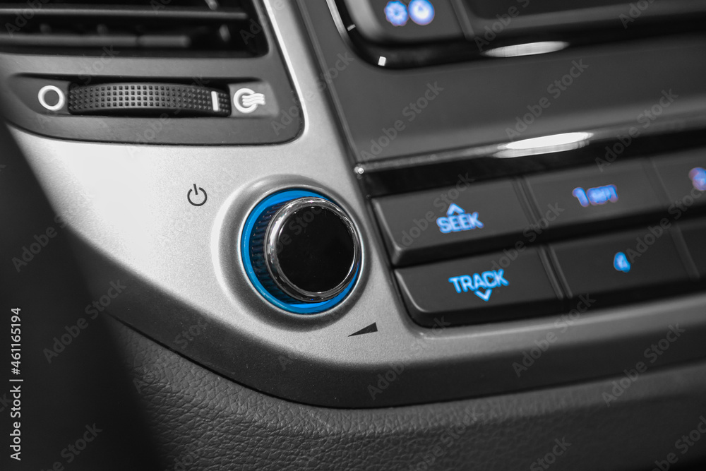 Close-up start button, turn on on car dashboard Close-up start button, turn on on car dashboard