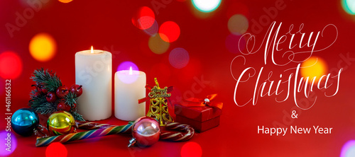 Happy New Year and Merry Christmas! card, banner, flat lay, with text - Merry Christmas, on a red background