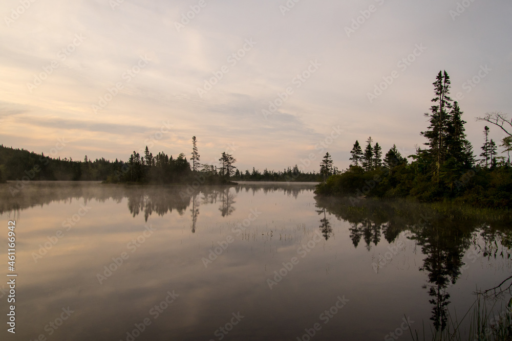 A view of a calm lake in the morning