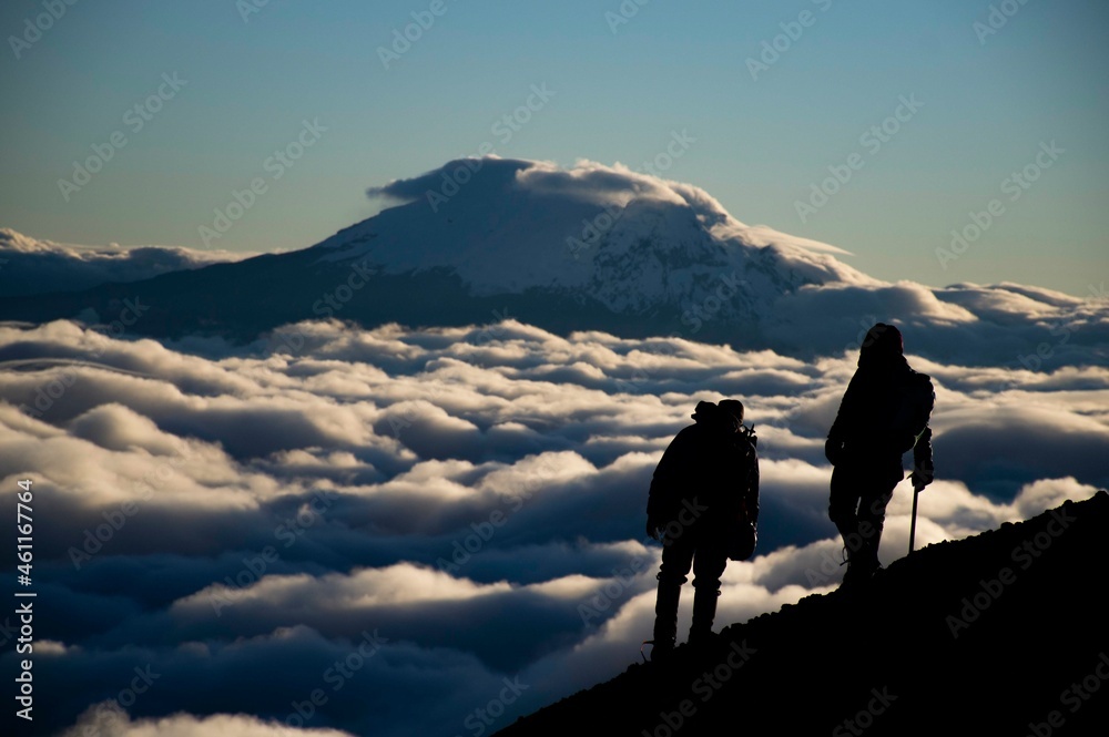 Climbers above the clouds