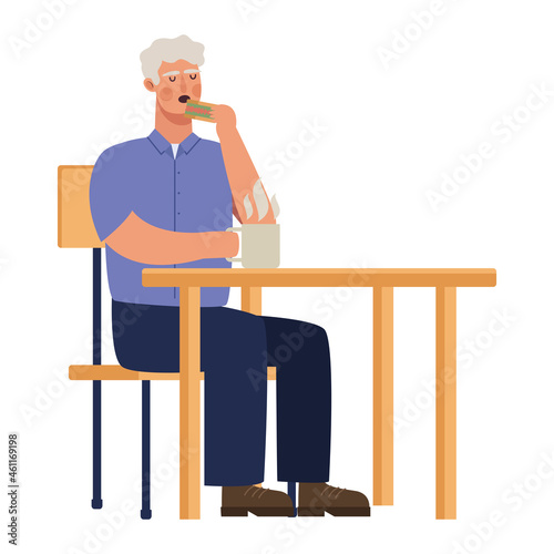 old man drinking coffee