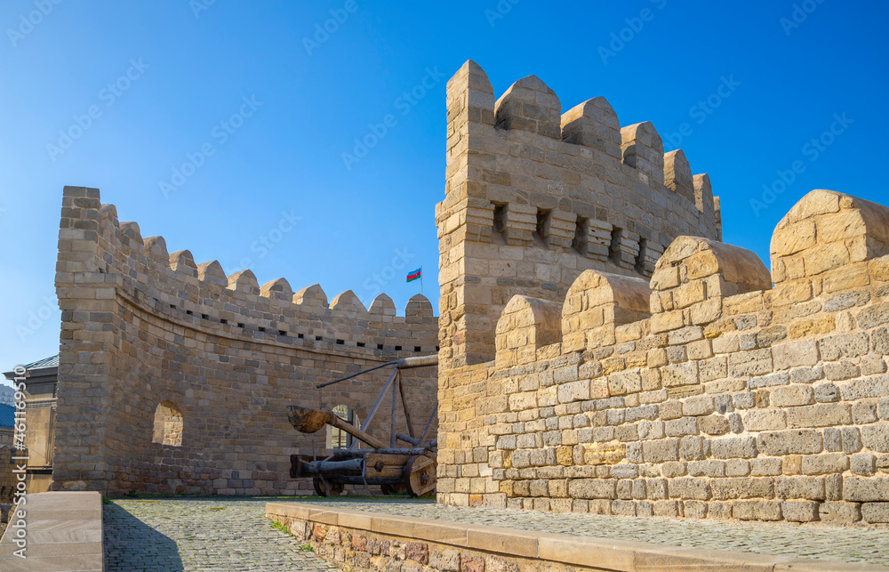 An ancient catapult on the tower of the Old City. Historical center of Baku, Azerbaijan An ancient catapult on the tower of the Old City. Historical center of Baku, Azerbaijan