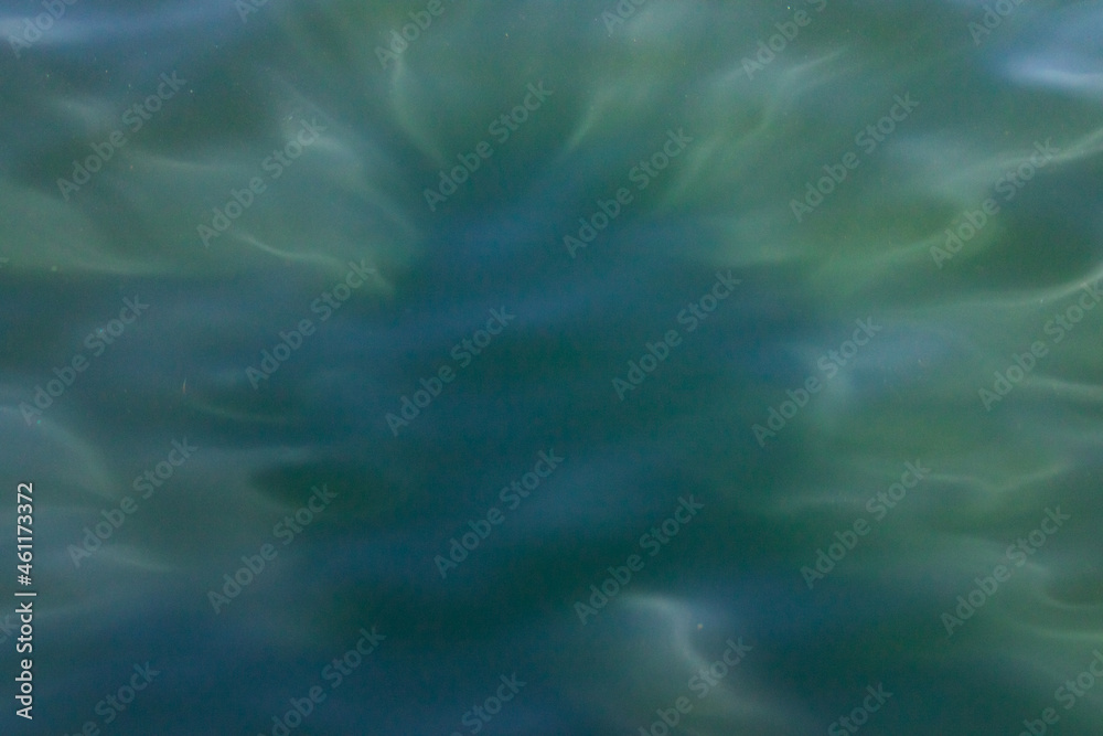 Background of River Water Shimmering in Diffused Sunlight